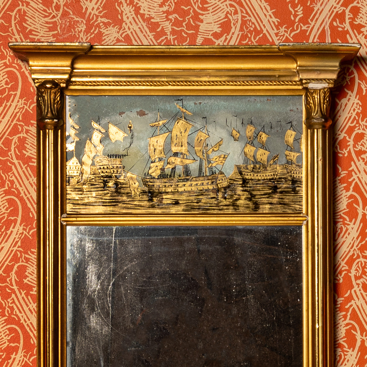 Reverse-painted ship’s mirror, 19th century giltwood