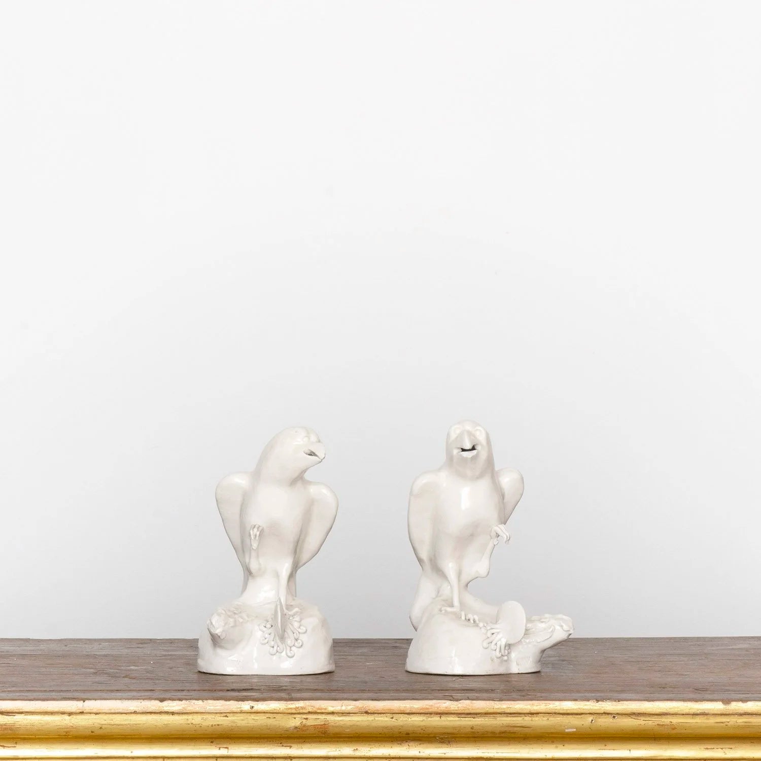 PAIR OF BLANC DE CHINE PARROTS