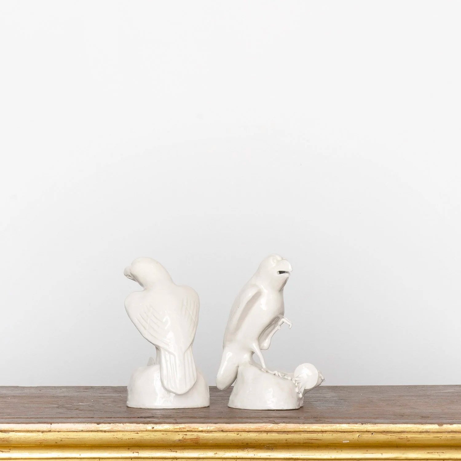 PAIR OF BLANC DE CHINE PARROTS