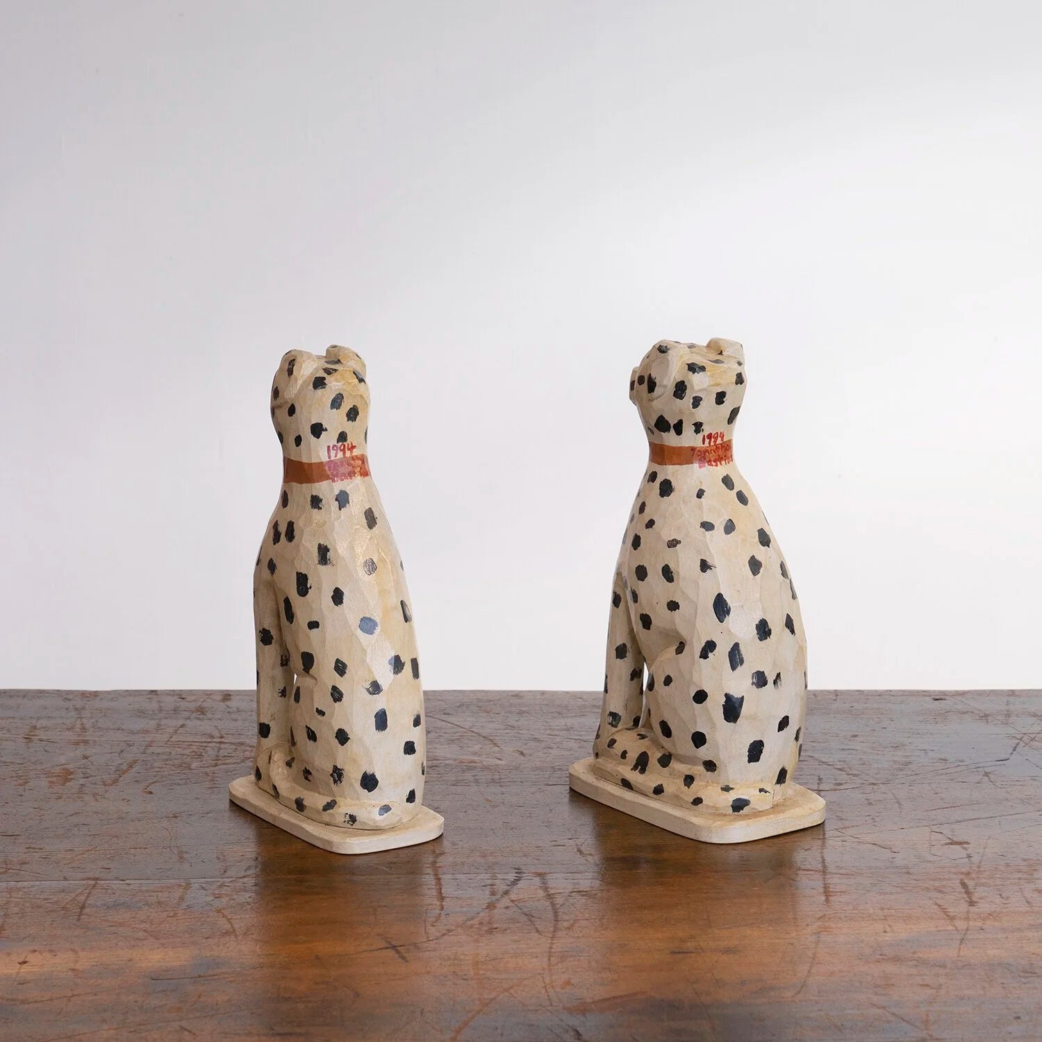 PAIR OF DOG FIGURINES BY JONATHAN BASTIAN