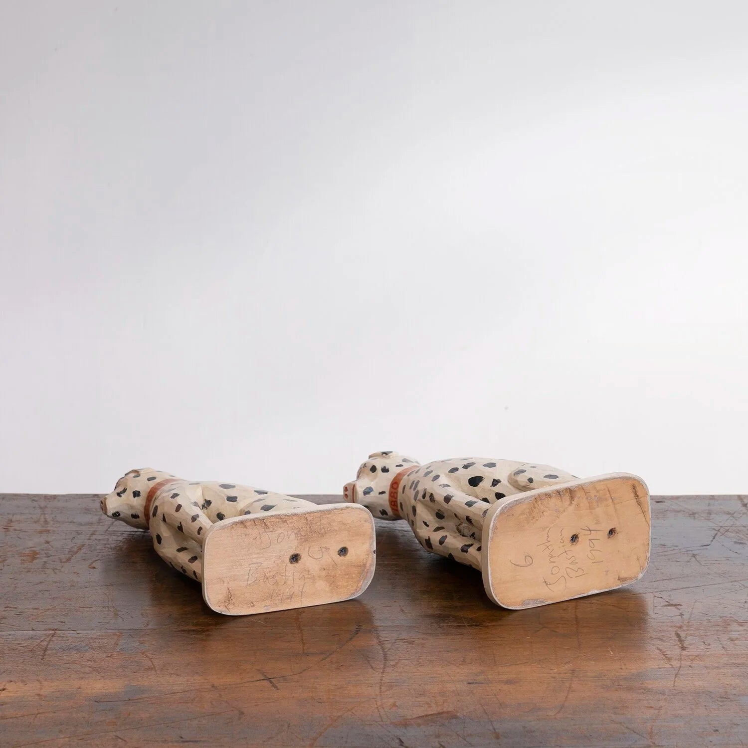 PAIR OF DOG FIGURINES BY JONATHAN BASTIAN