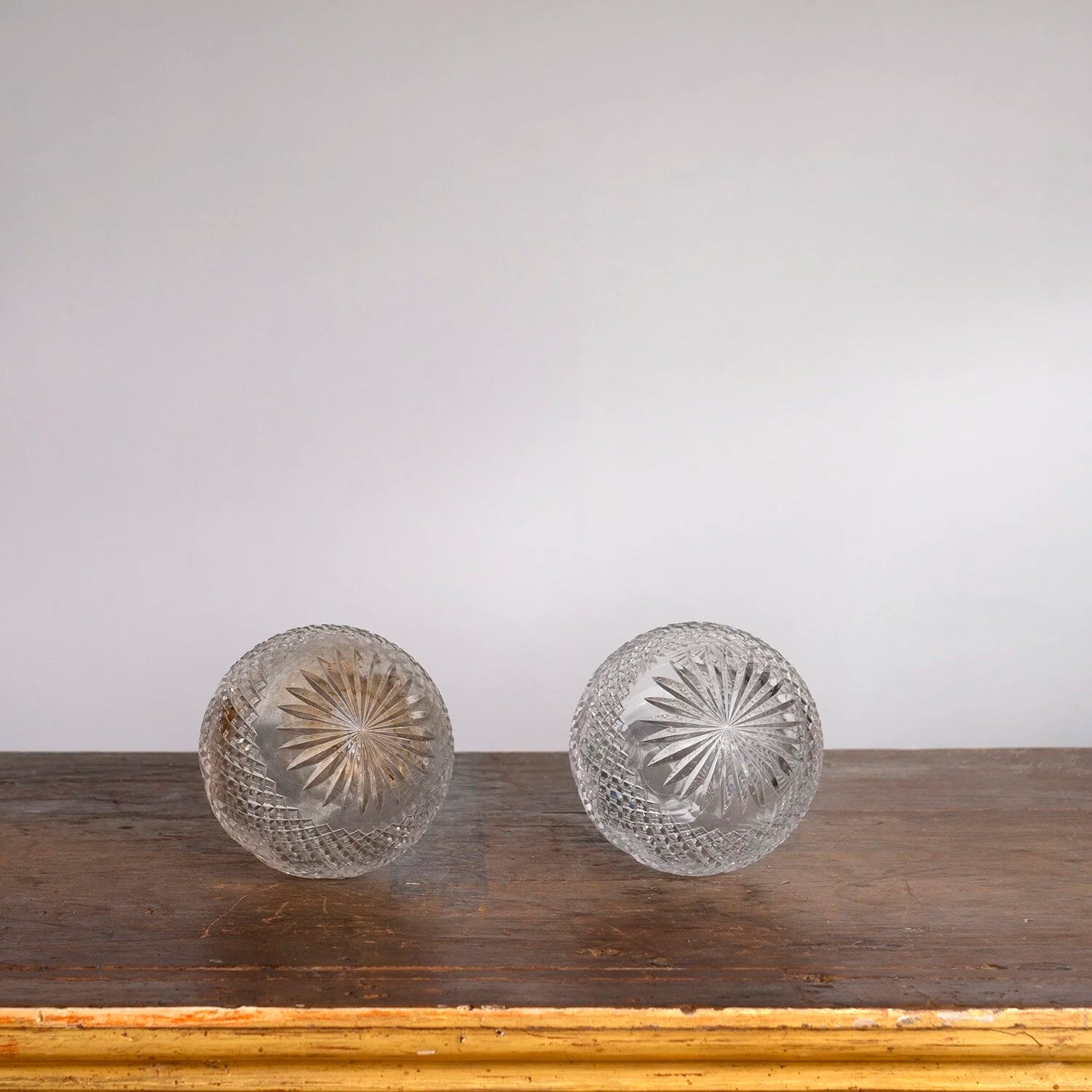 PAIR OF ENGLISH EDWARDIAN SILVER TOPPED PERFUME BOTTLES