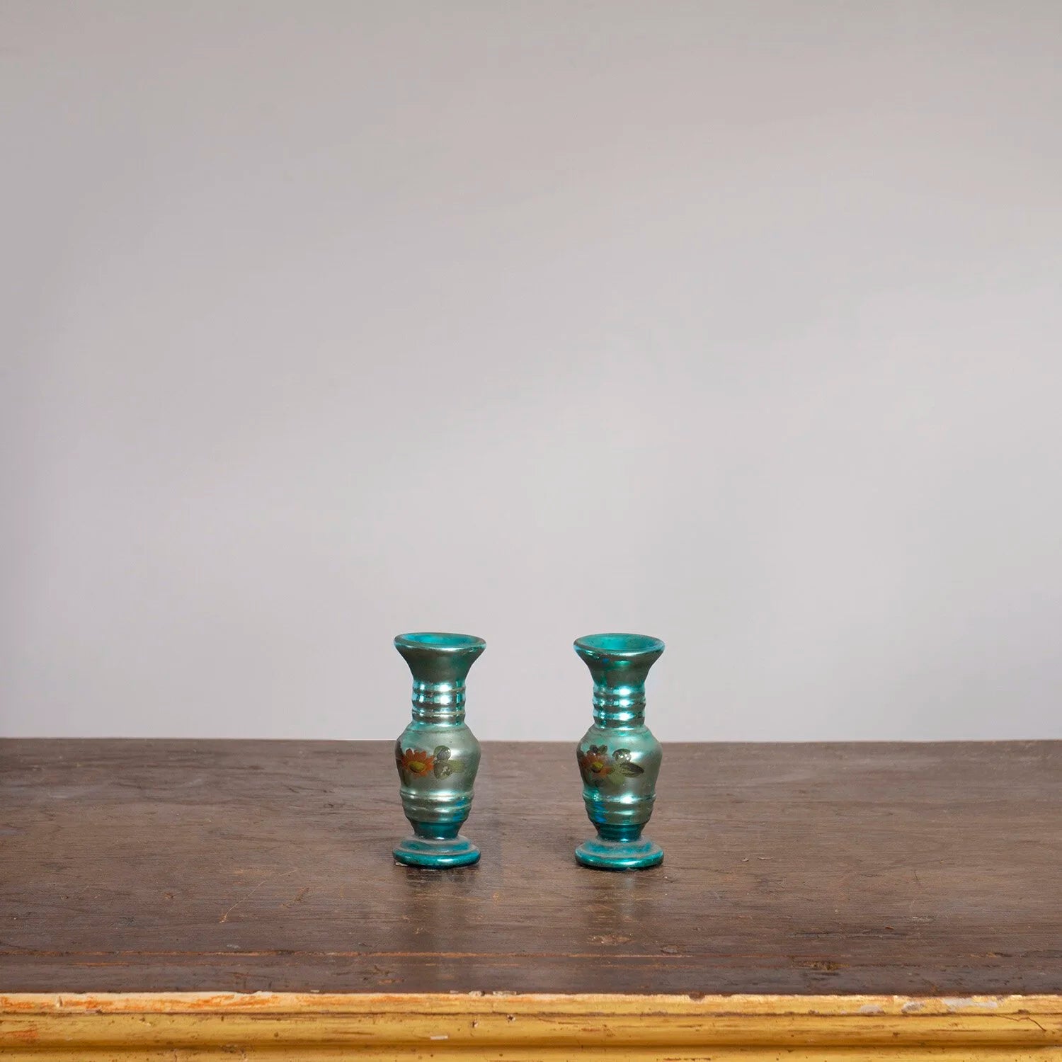 PAIR OF SMALL BLUE MERCURY GLASS VASES
