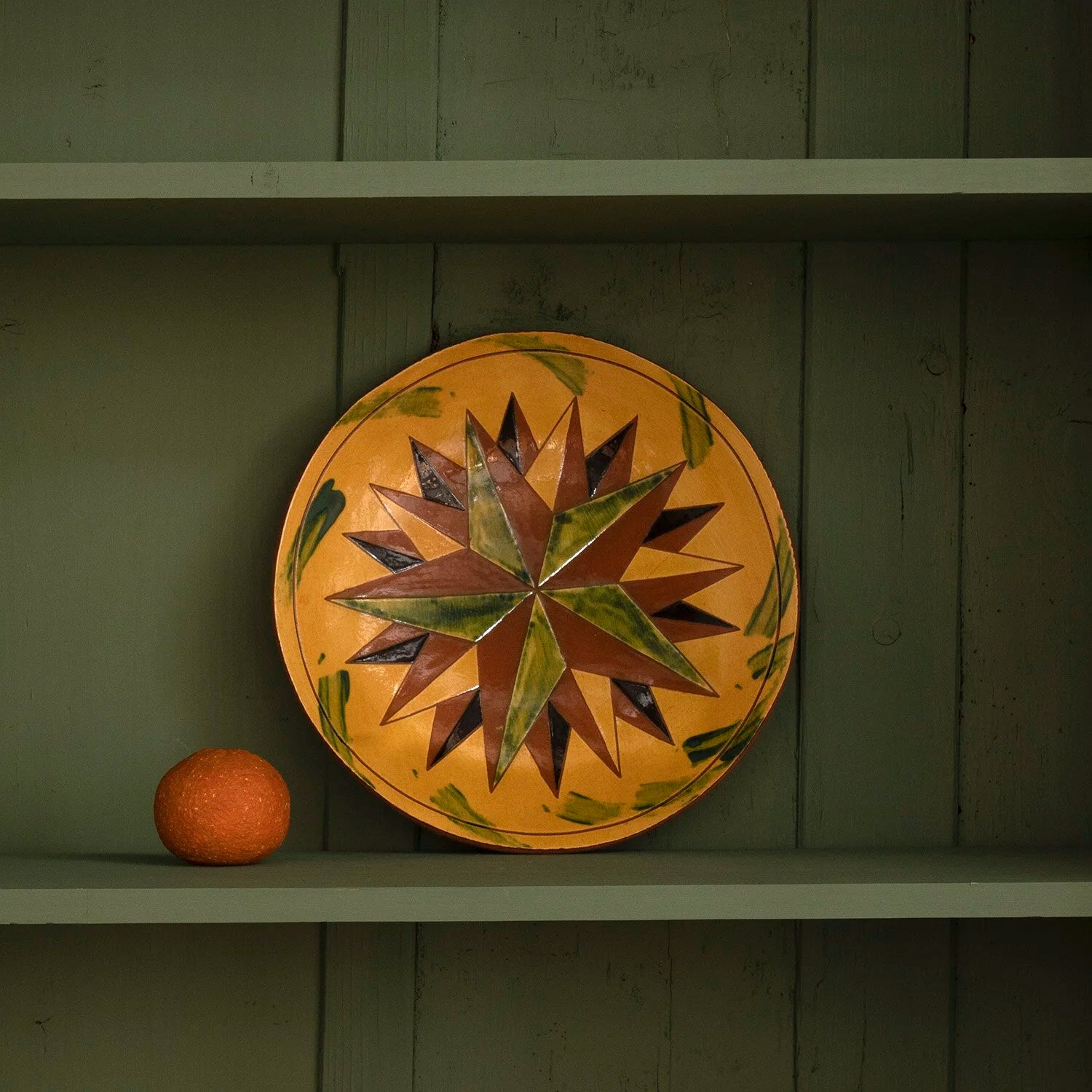 REDWARE PLATE WITH 20 POINT STAR