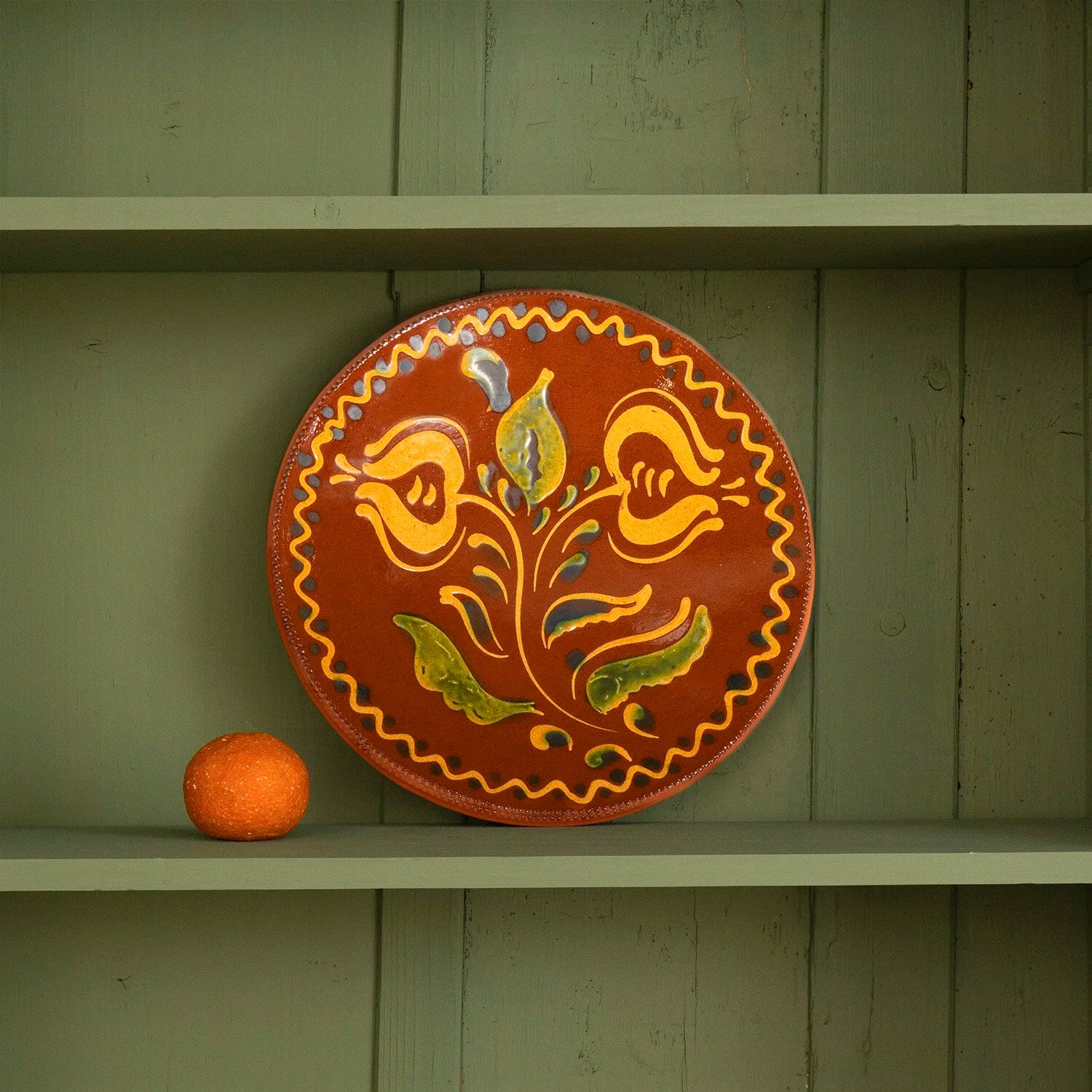 REDWARE PLATE WITH FLOWER MOTIF