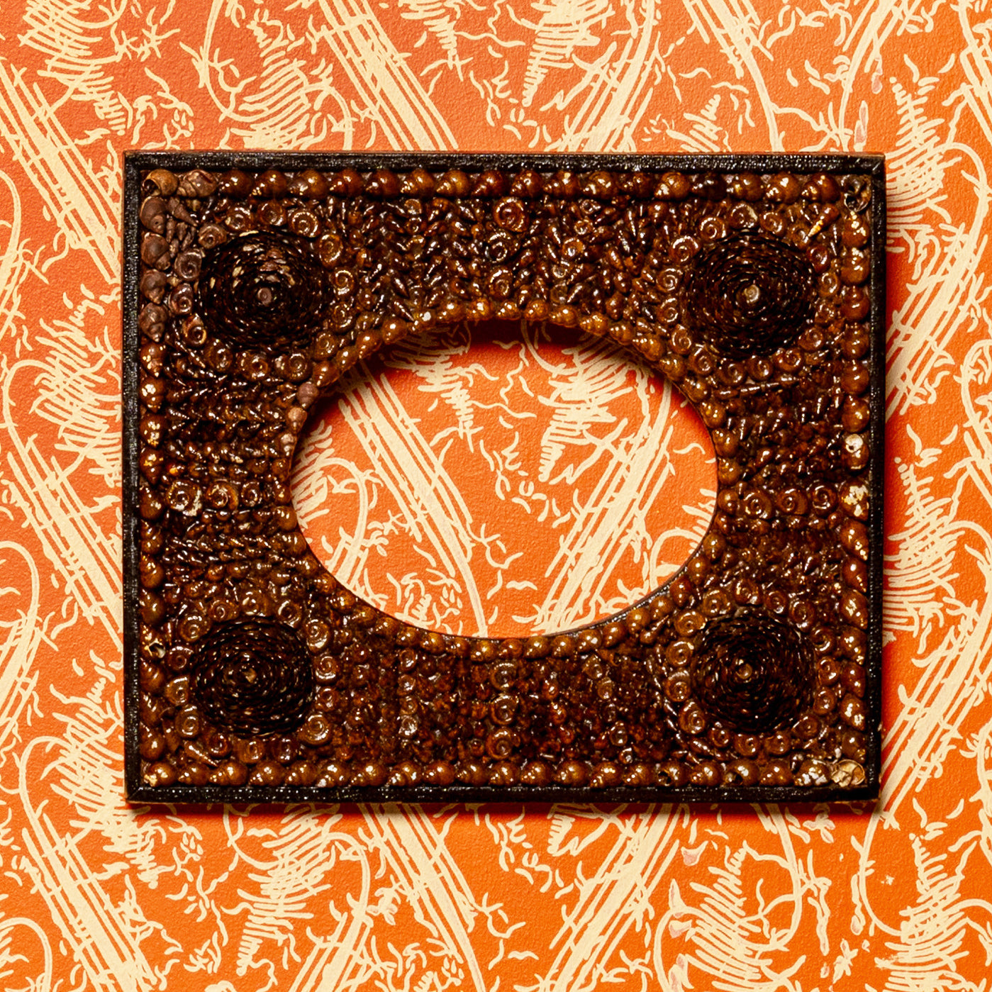 LATE 19TH-CENTURY VICTORIAN SHELLWORK FRAME IN THE SAILOR'S VALENTINE TRADITION