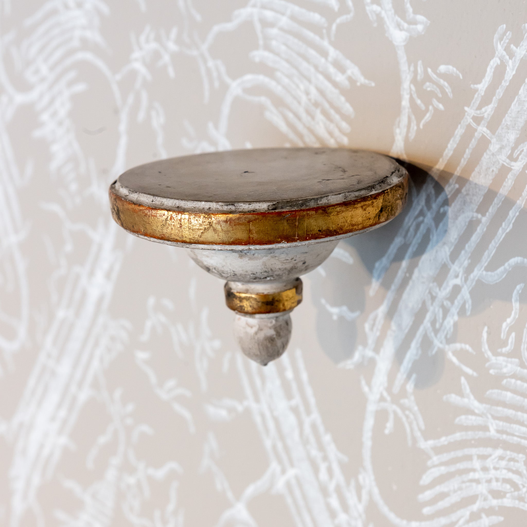 COLLECTION OF SIXTEEN 18TH-CENTURY ANTIQUE WALL BRACKETS WITH PAPER  FLOWERS ON HAND TURNED WOOD BASES