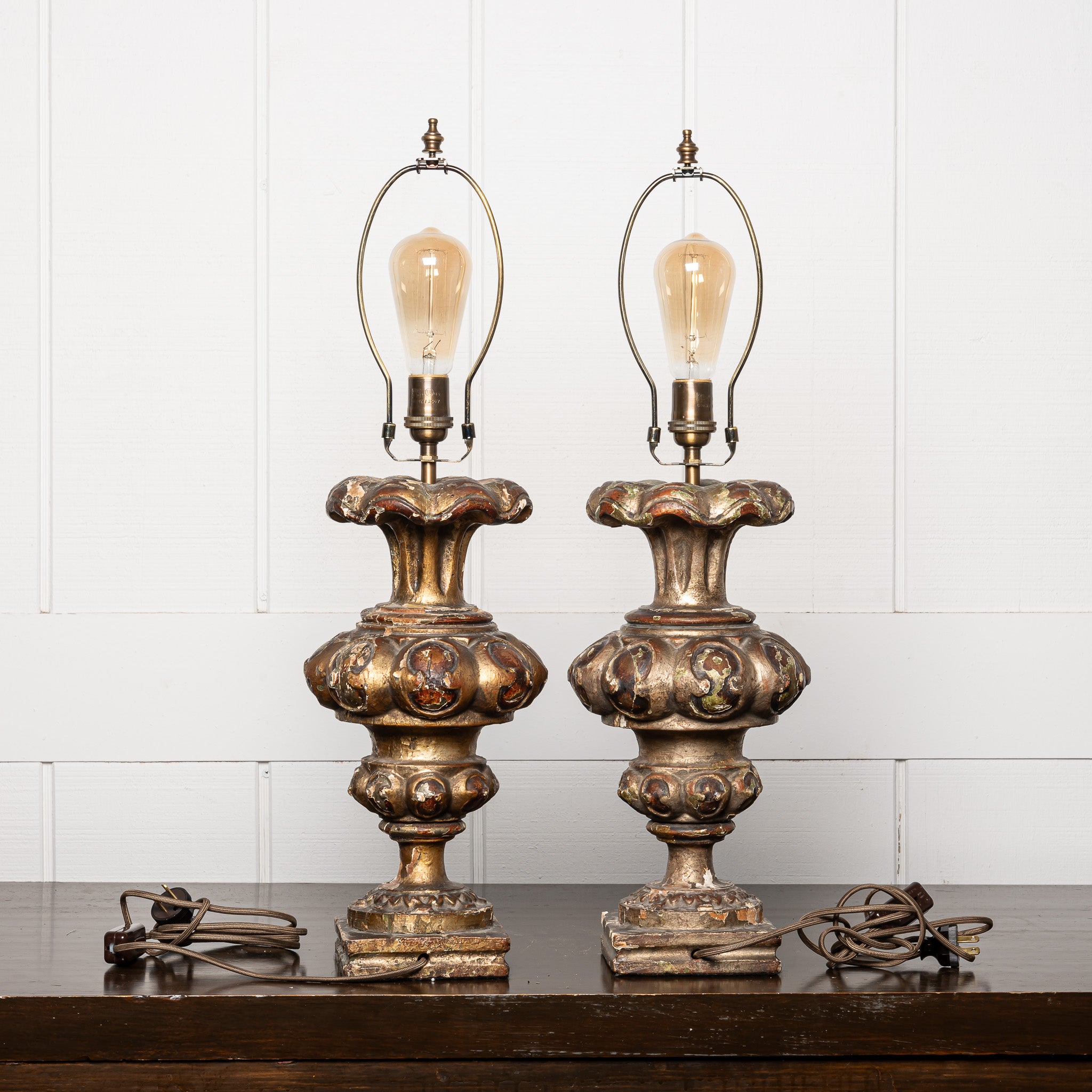 PAIR OF 18TH-CENTURY ITALIAN BAROQUE GILTWOOD "ALTAR CANDLESTICKS" MOUNTED AS TABLE LAMPS