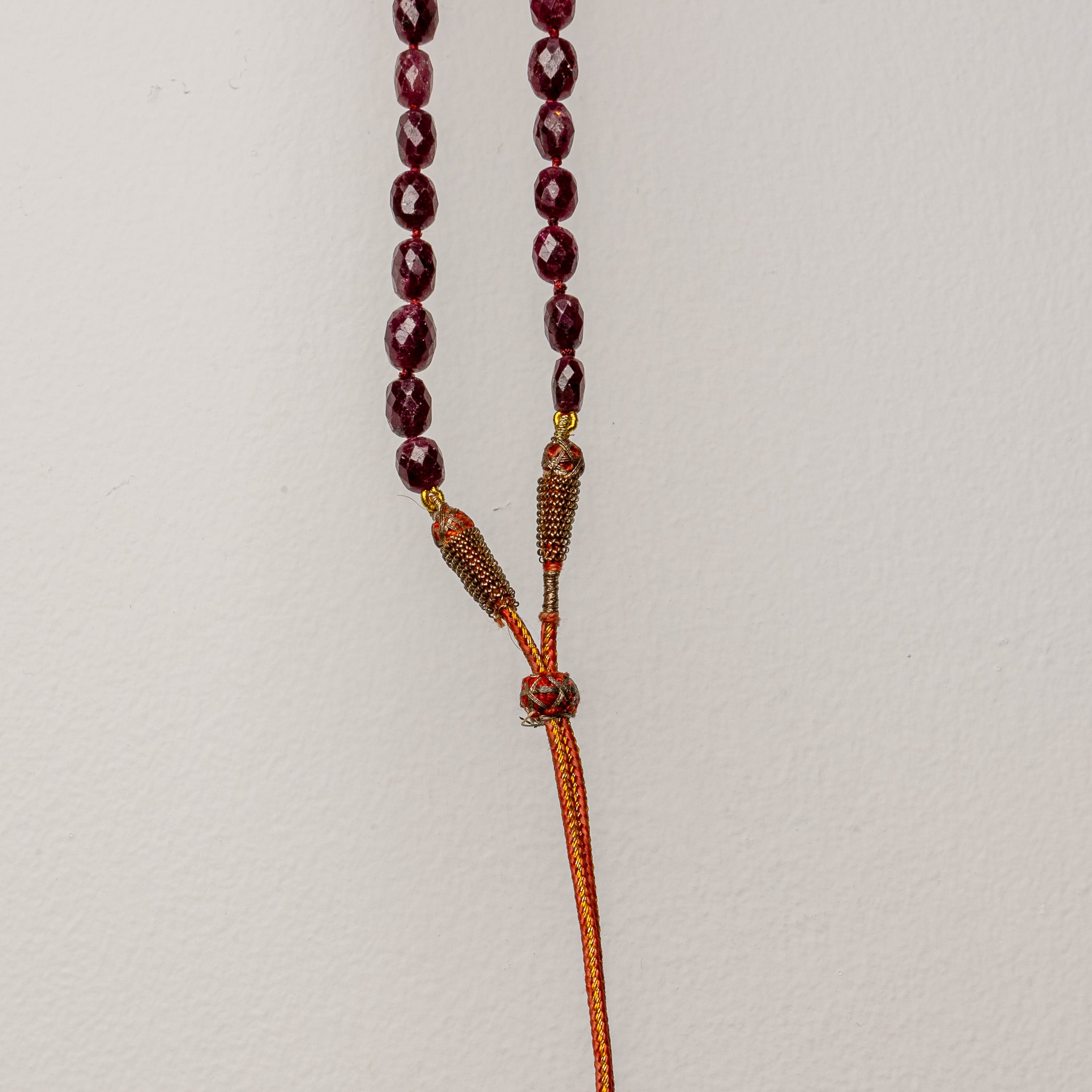 19TH-CENTURY INDIAN MUGHAL FACETED RUBY PRAYER BEADS