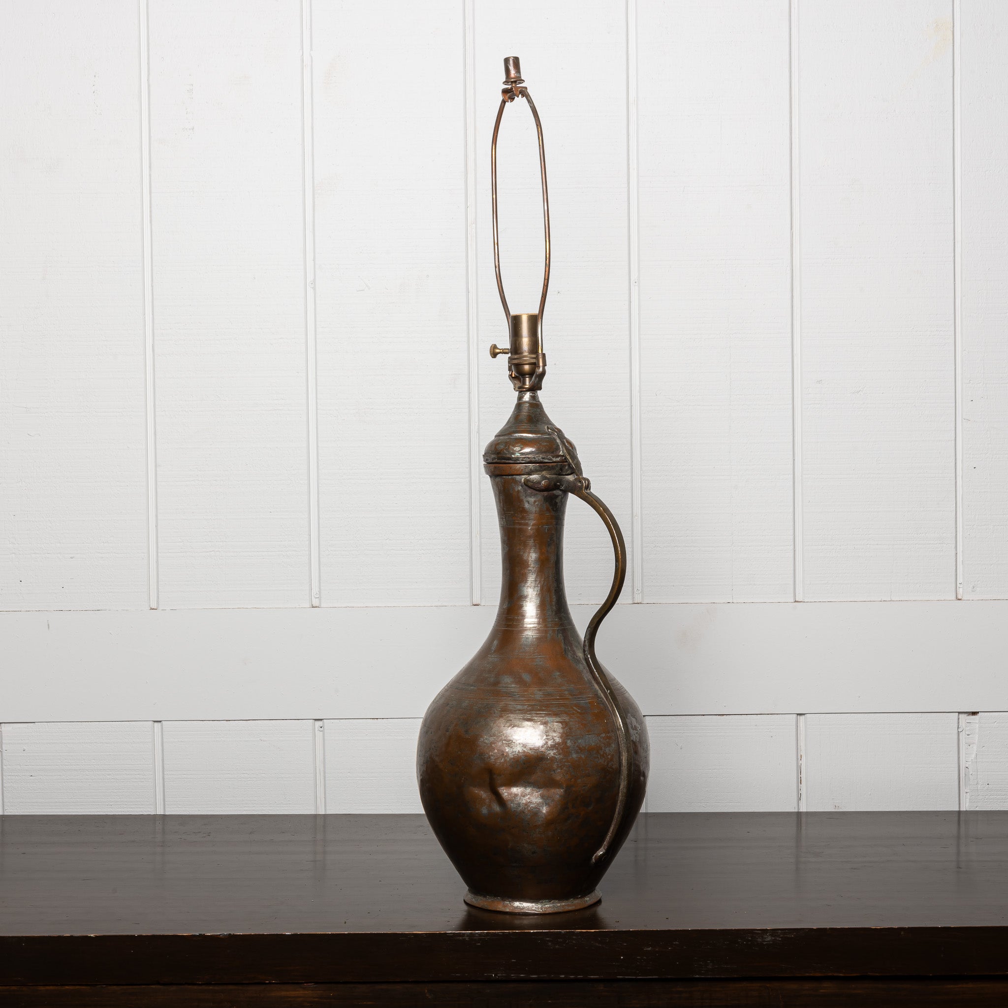 LATE 19TH-CENTURY OTTOMAN COPPER WATER VESSEL MOUNTED AS A TABLE LAMP