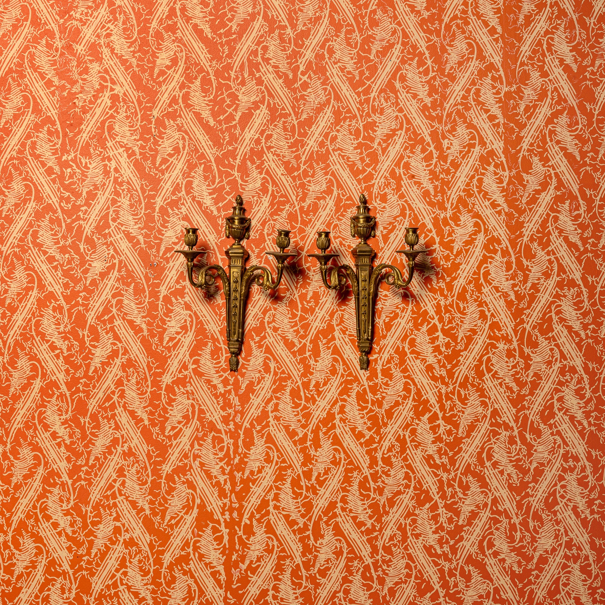 PAIR OF FRENCH LOUIS XVI STYLE CAST BRASS TWO ARM WALL SCONCES