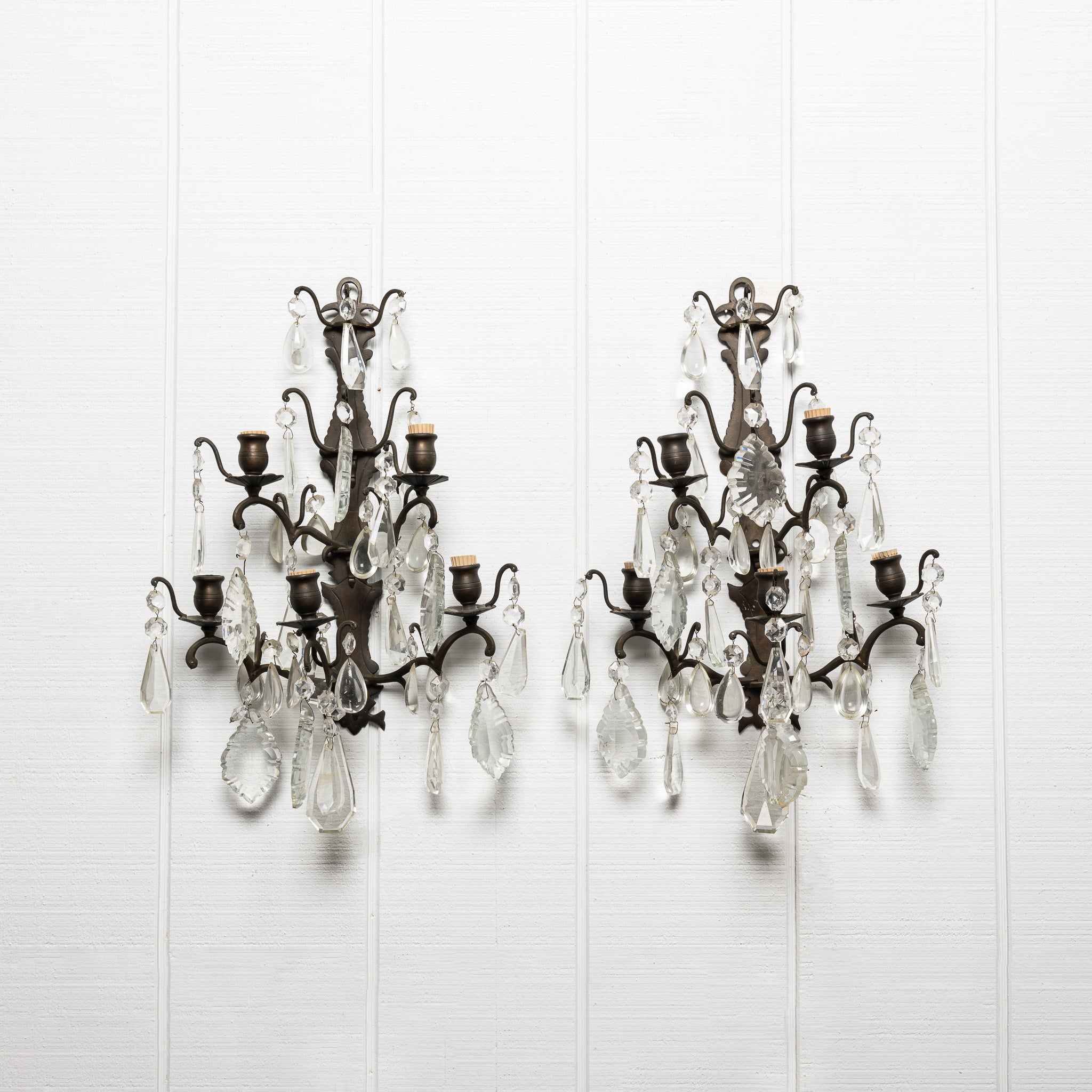 PAIR OF ITALIAN CRYSTAL AND PATINATED METAL FOUR LIGHT WALL SCONCES