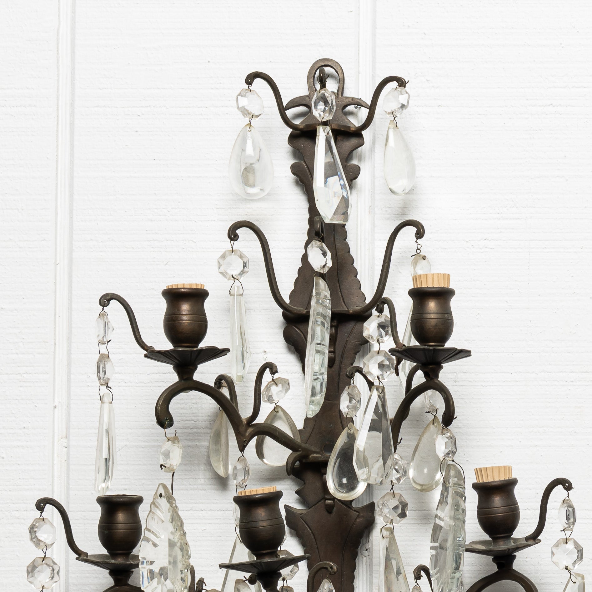 PAIR OF ITALIAN CRYSTAL AND PATINATED METAL FOUR LIGHT WALL SCONCES