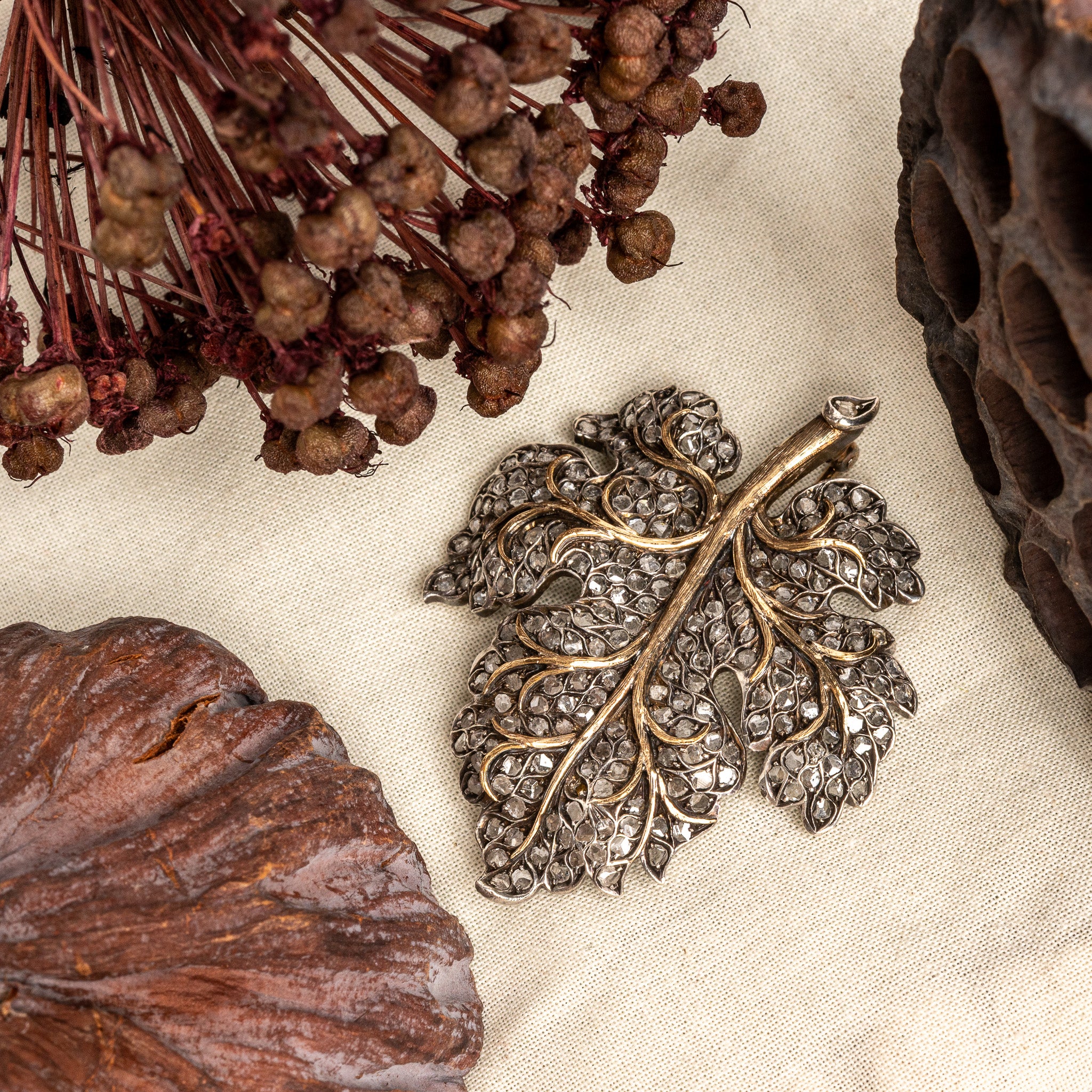 LATE 19TH-CENTURY SILVER, 14K GOLD, AND DIAMOND LEAF BROOCH