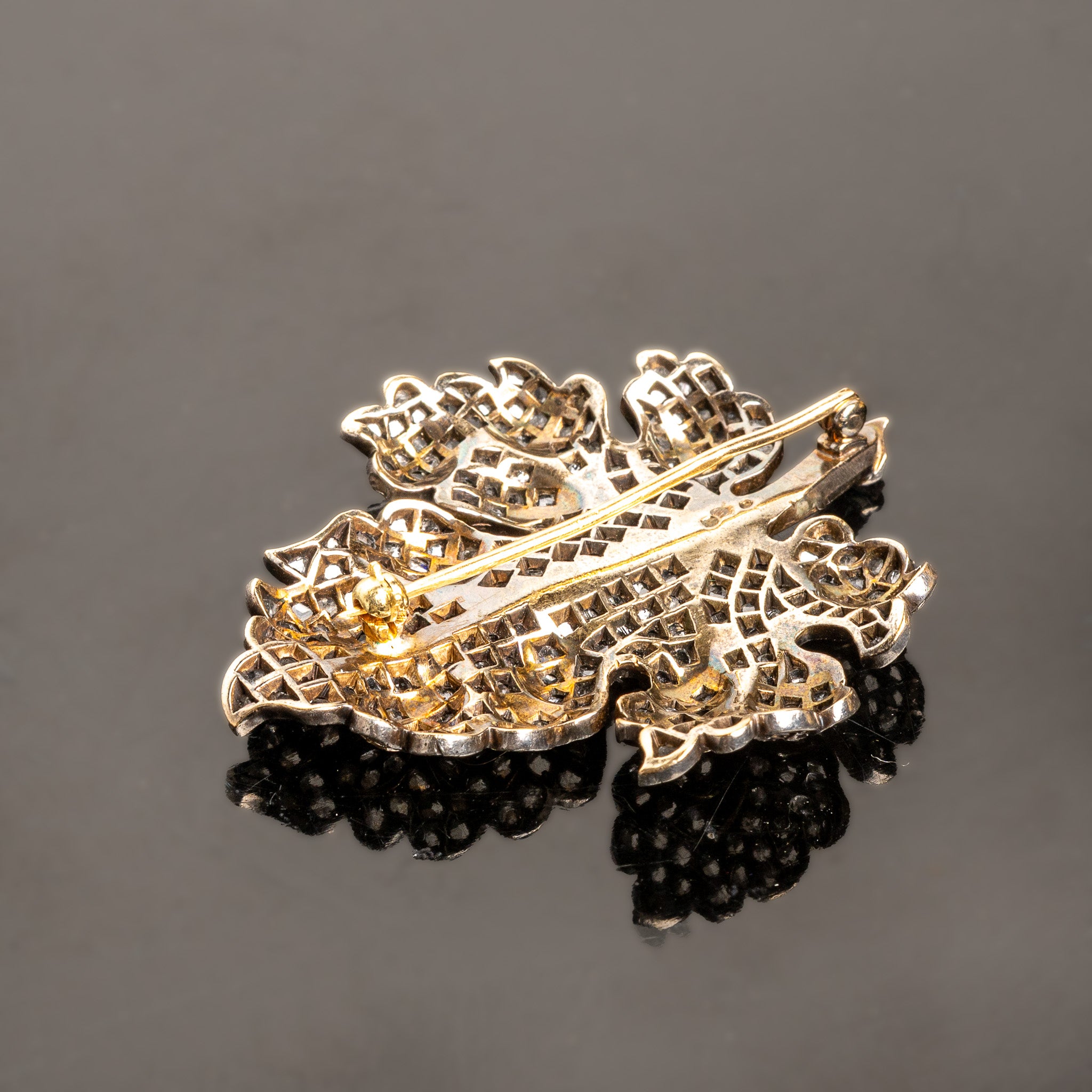 LATE 19TH-CENTURY SILVER, 14K GOLD, AND DIAMOND LEAF BROOCH