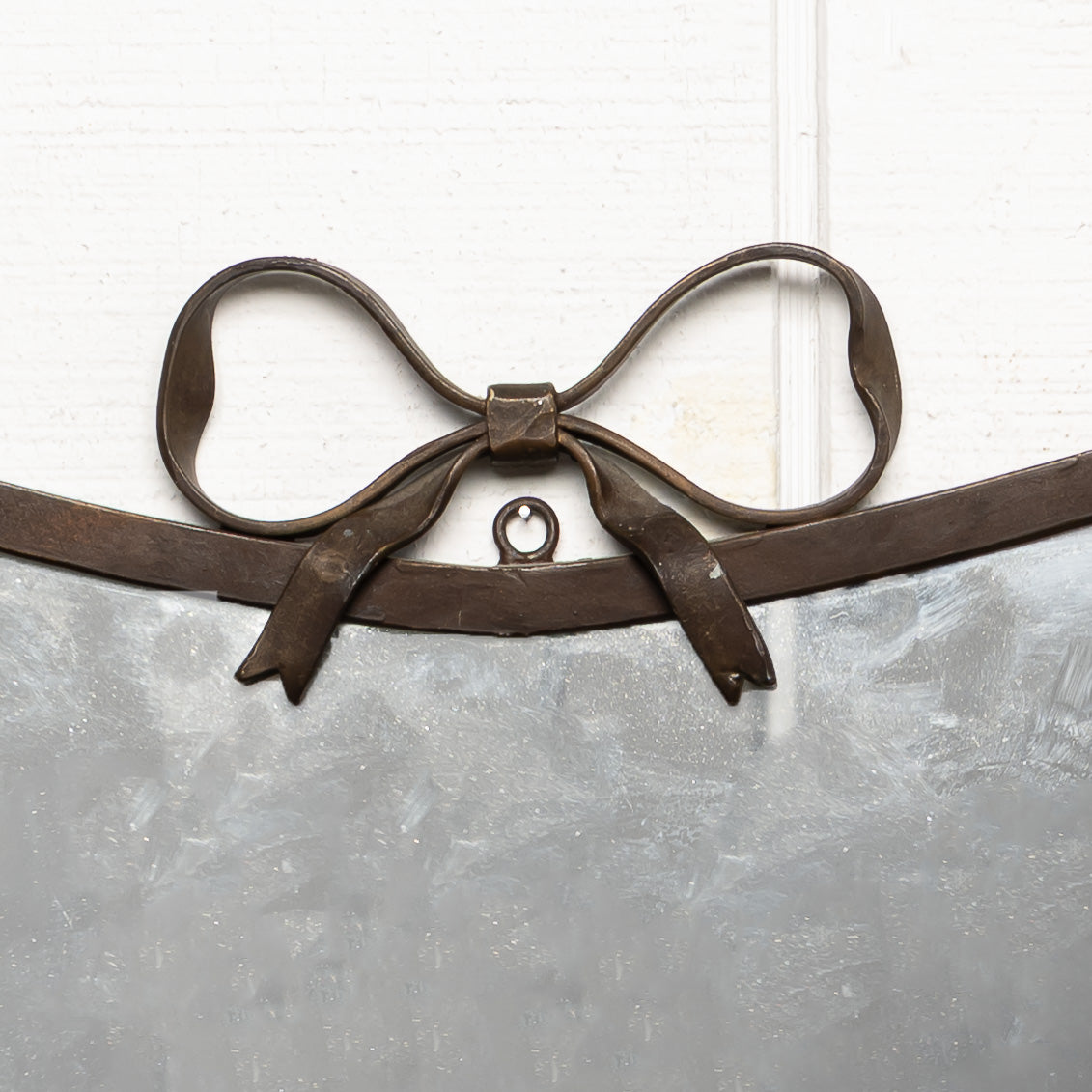 MID-CENTURY EUROPEAN "GIO PONTI STYLE" HAND-FORGED BRASS MIRROR