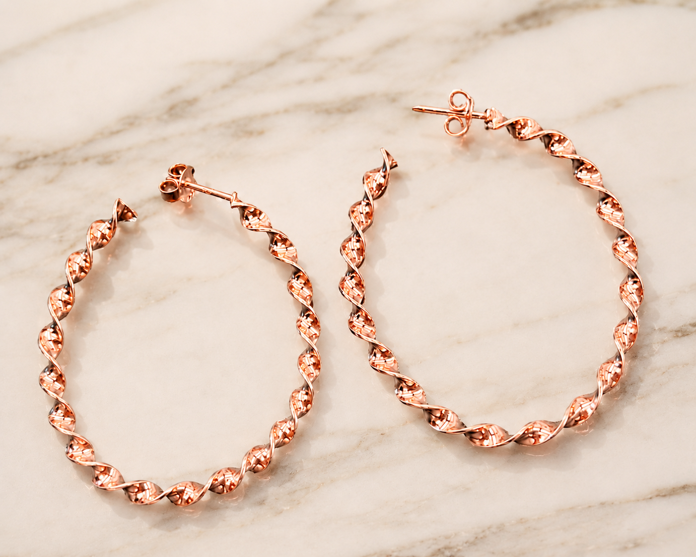 SAVED New York ROSE GOLD VERMEIL "TWIST" HOOP EARRINGS