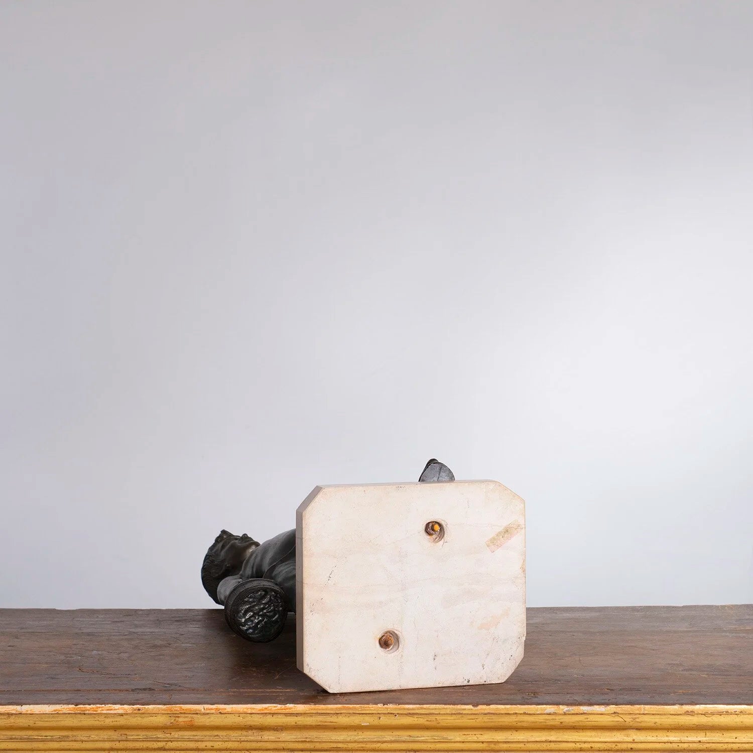 STATUE OF A FISH MONGER