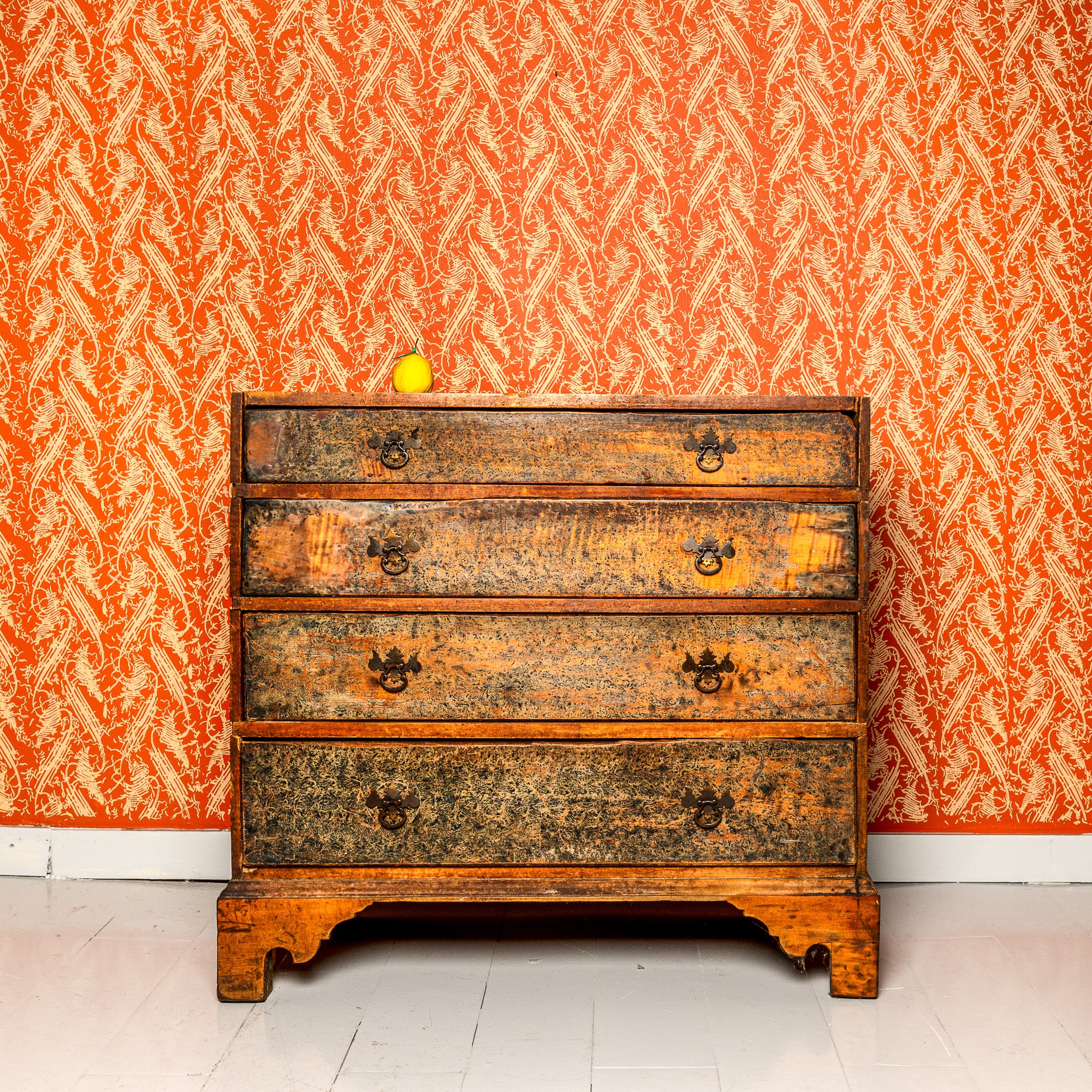 18th century American chest of drawers with folk art decoration