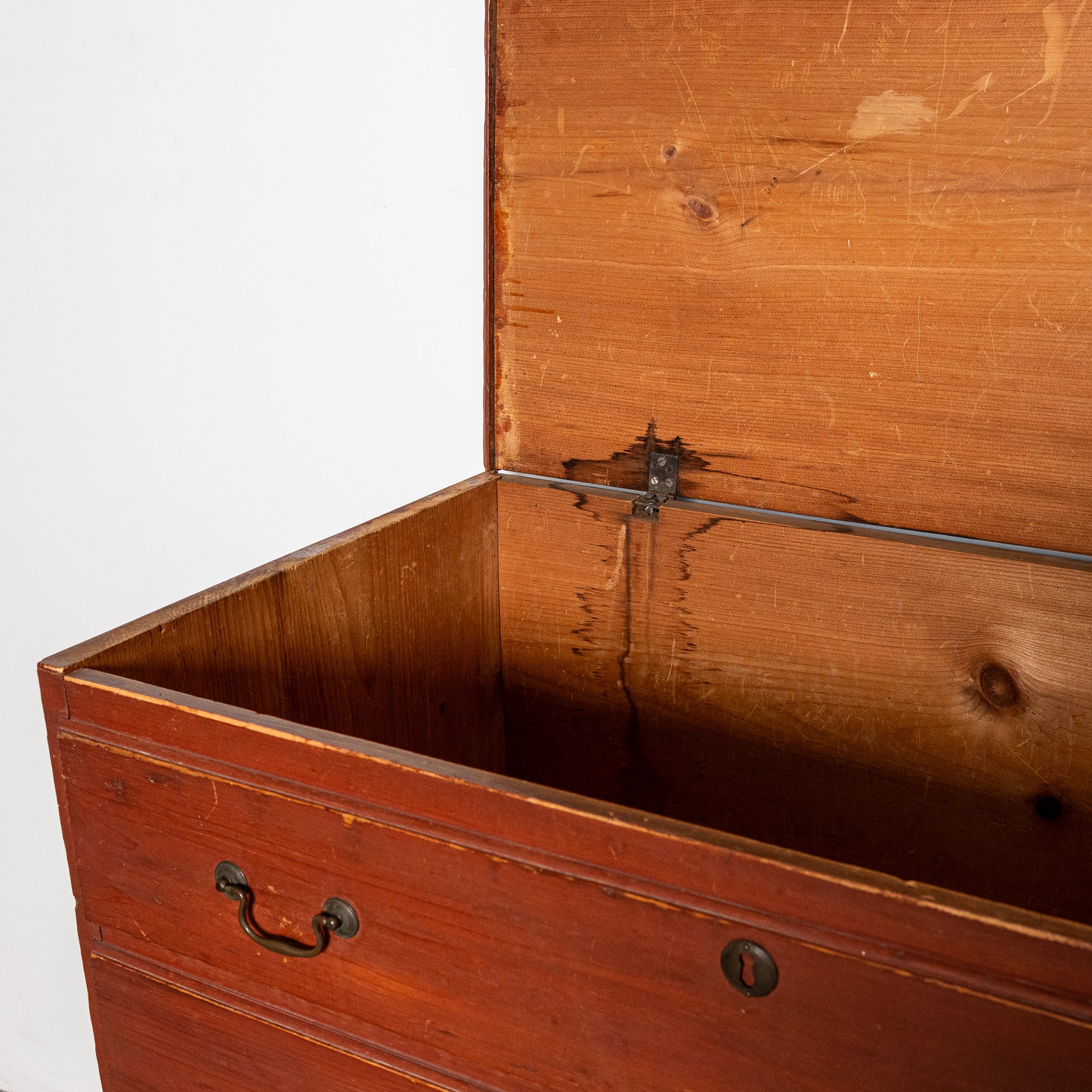19th century American red painted lift-top chest of drawers