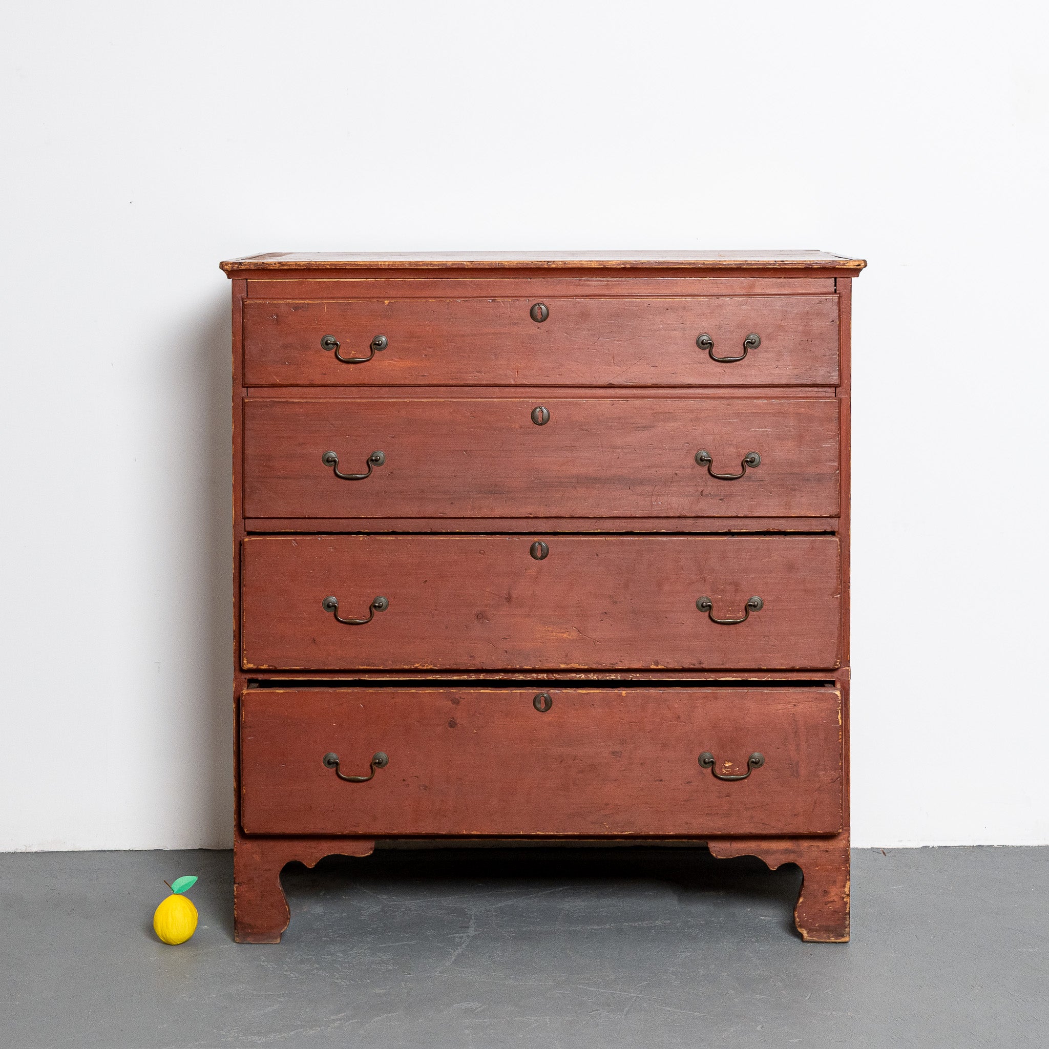 19th century American red painted lift-top chest of drawers