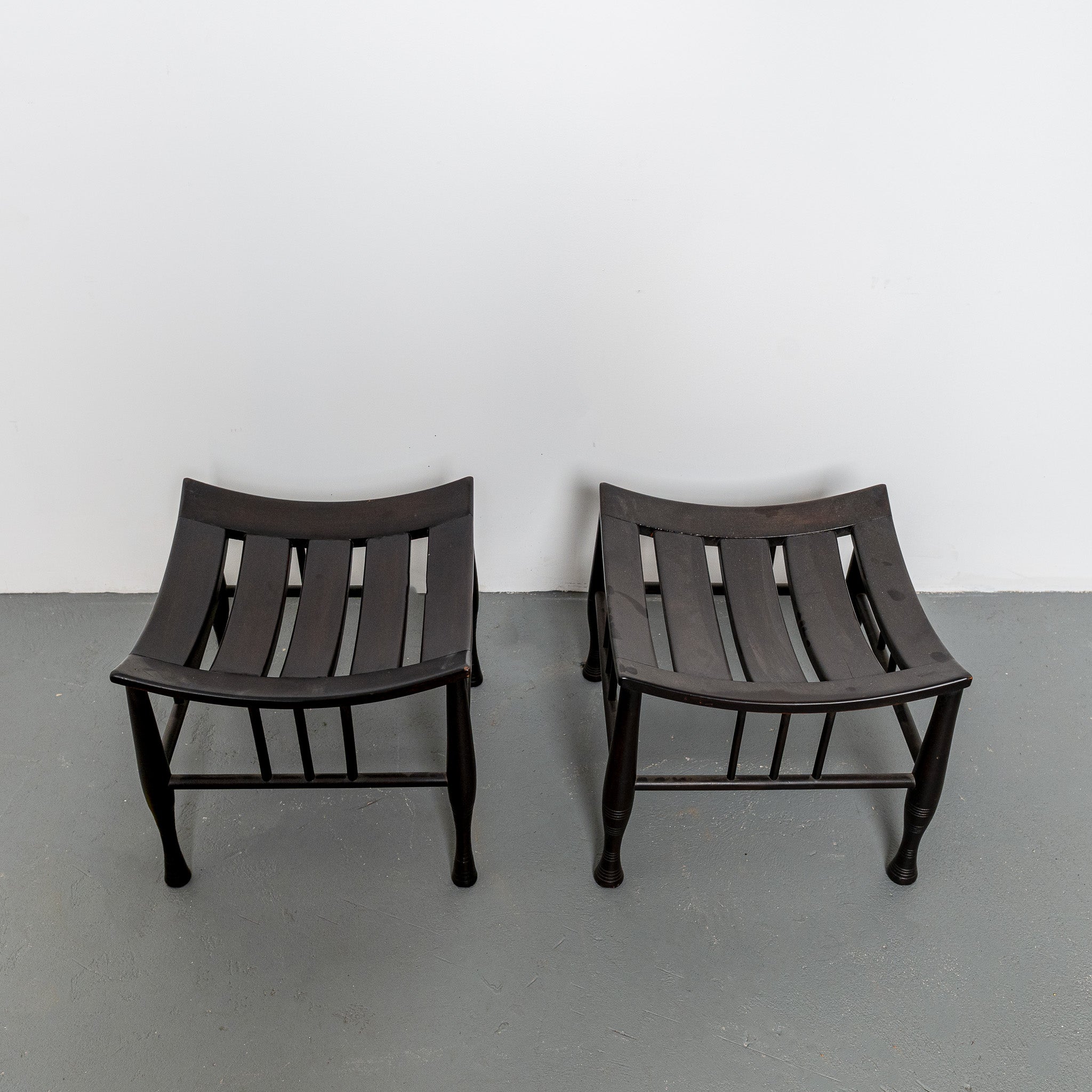 Pair of early 20th century English ebonized Thebes stools