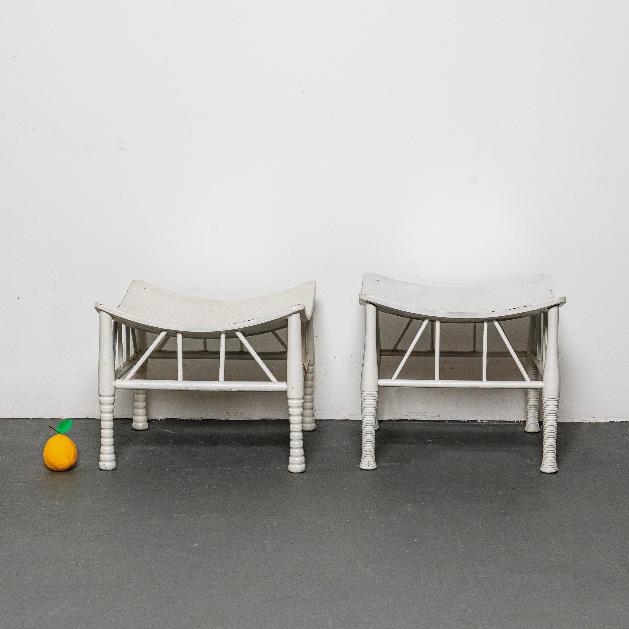 Pair of early 20th century English white painted Thebes stools