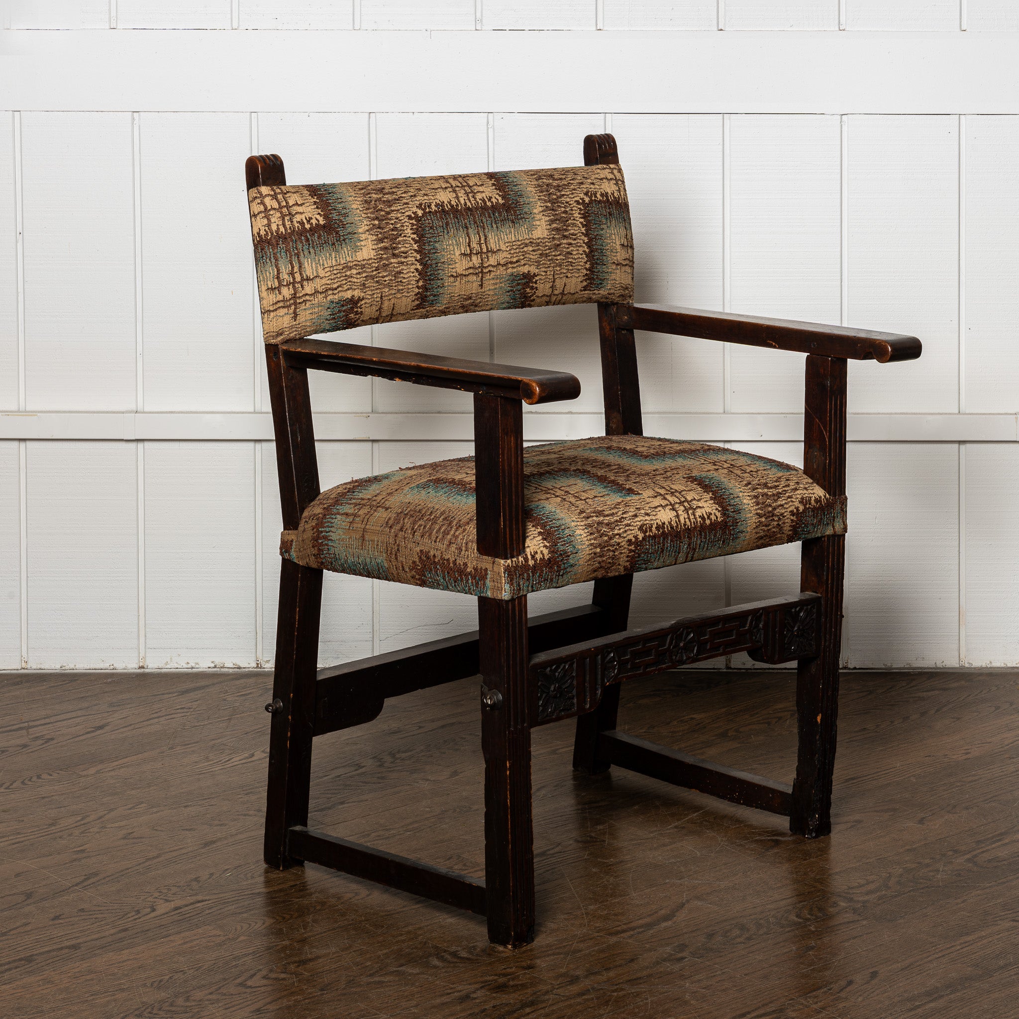 17th / 18th centuty carved European arm chair newly upholstered in antique Art Deco fabric