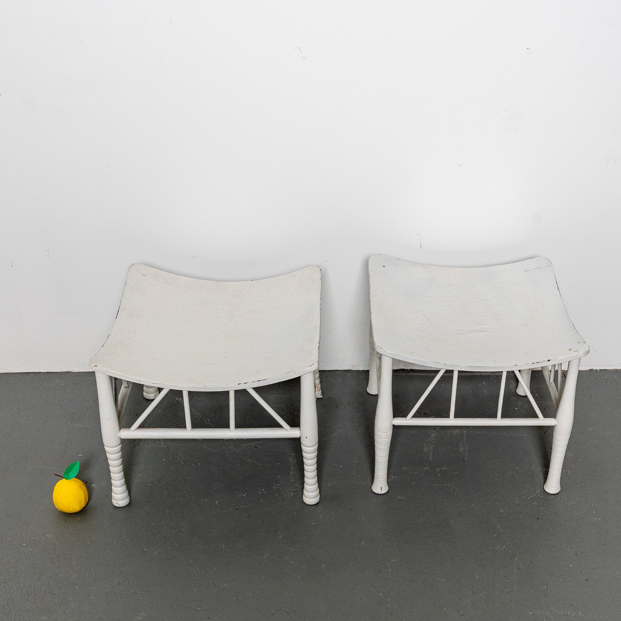 Pair of early 20th century English white painted Thebes stools