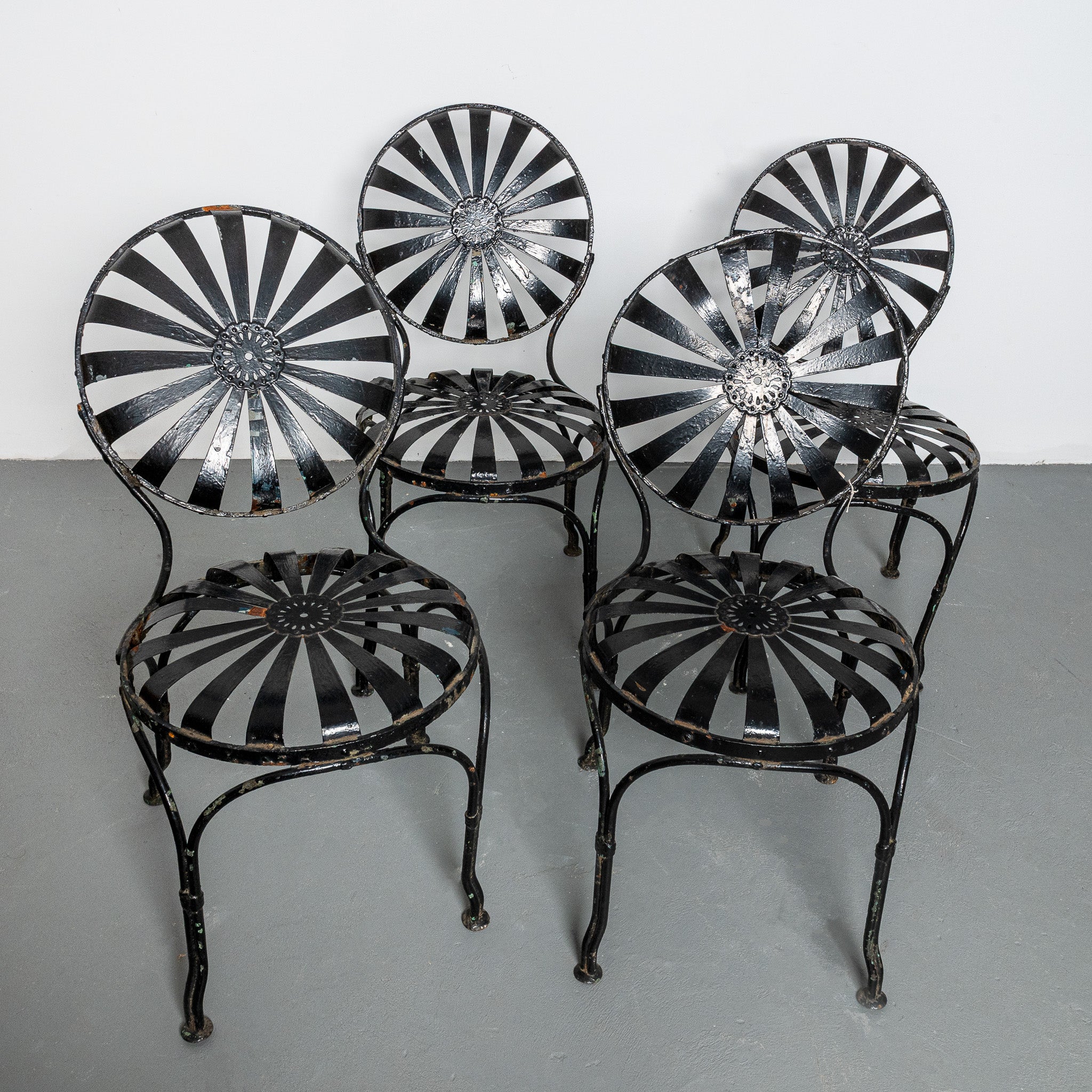 Set of four American Art Deco painted patio chairs