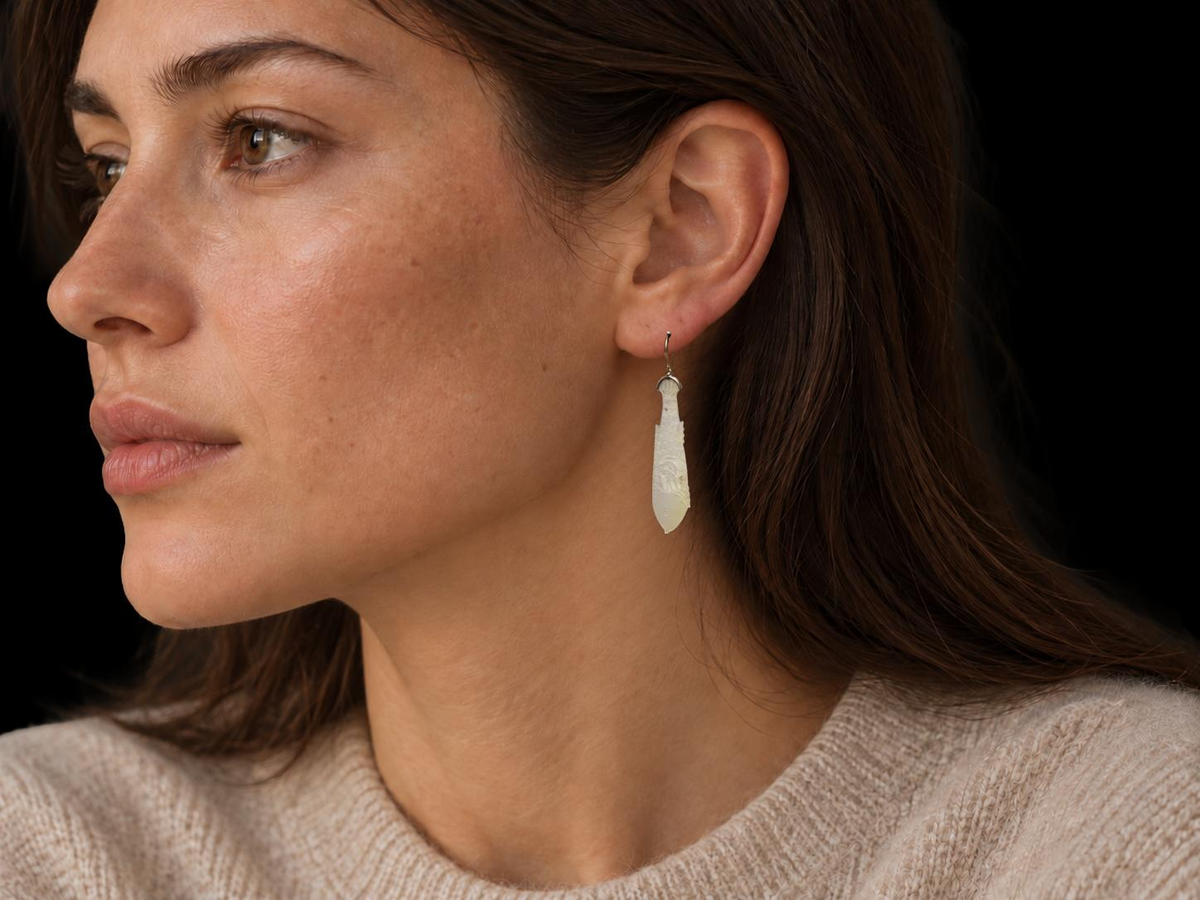 18TH CENTURY MOTHER OF PEARL GAMING CHIP EARRINGS, illustrative wearing view