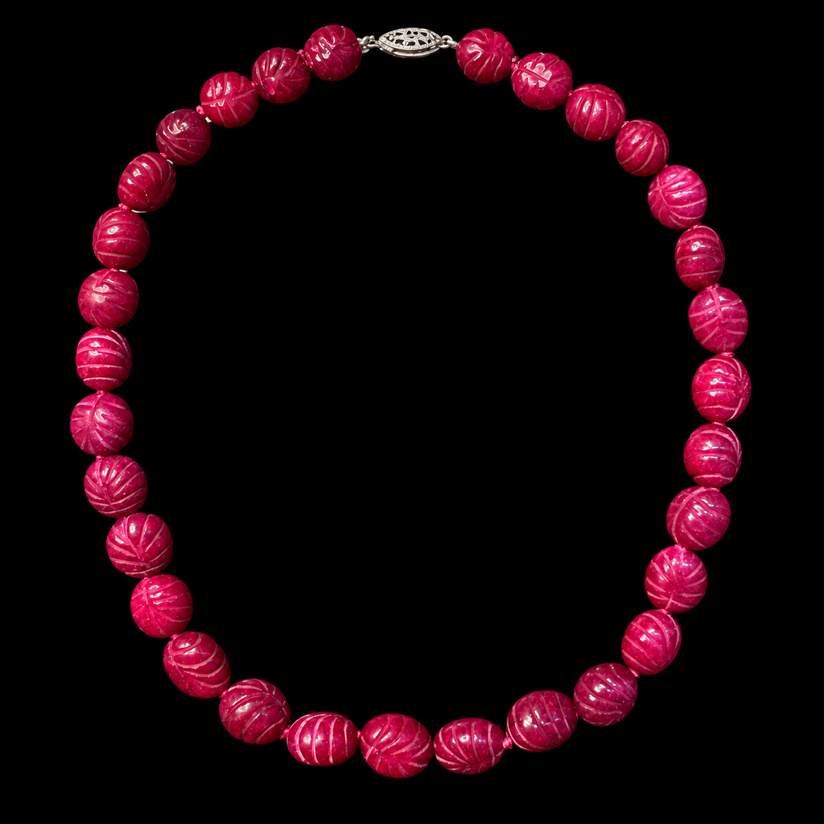 MUGHAL INSPIRED CARVED RUBY COLORED STONE NECKLACE, FULL VIEW ON BLACK