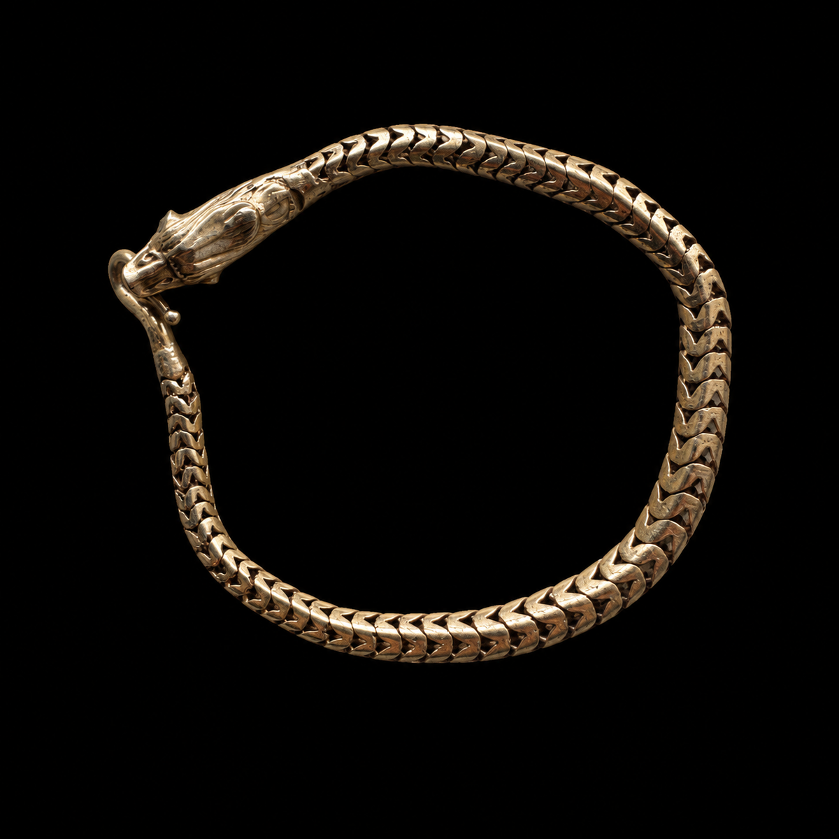 Georgian pinchbeck and garnet snake bracelet on black
