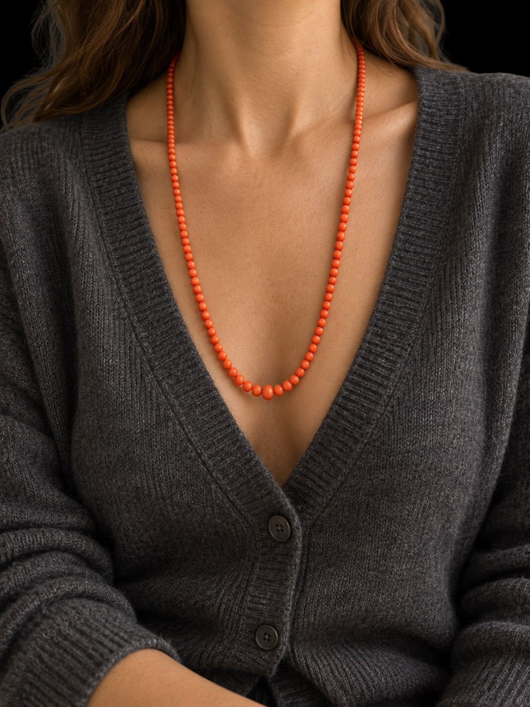 19TH CENTURY VICTORIAN NATURAL CORAL BEAD NECKLACE — worn view