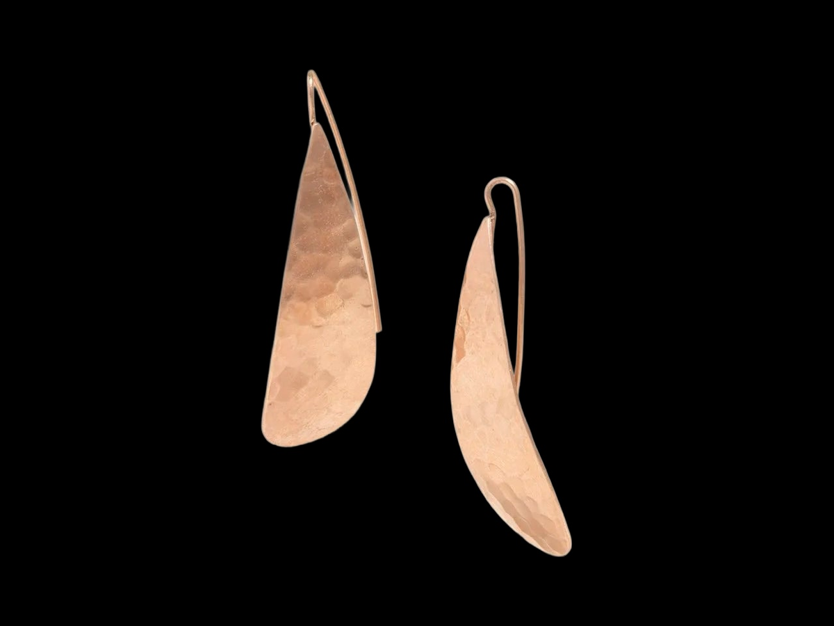 LURE EARRINGS on black background