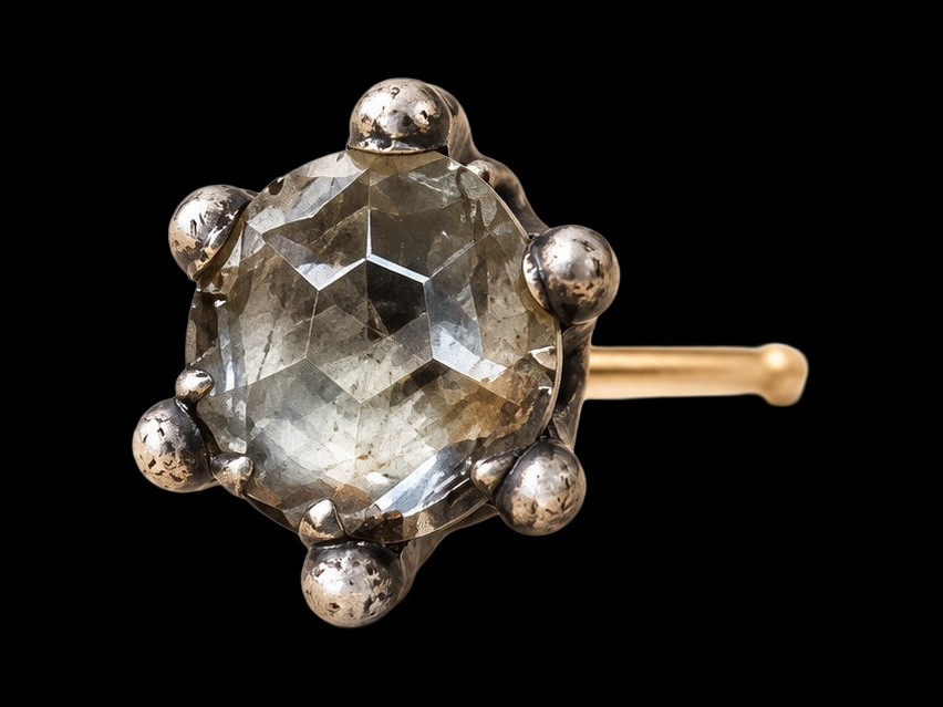 18TH CENTURY ROCK CRYSTAL SINGLE EARRING IN SILVER AND 14 KARAT GOLD on black background