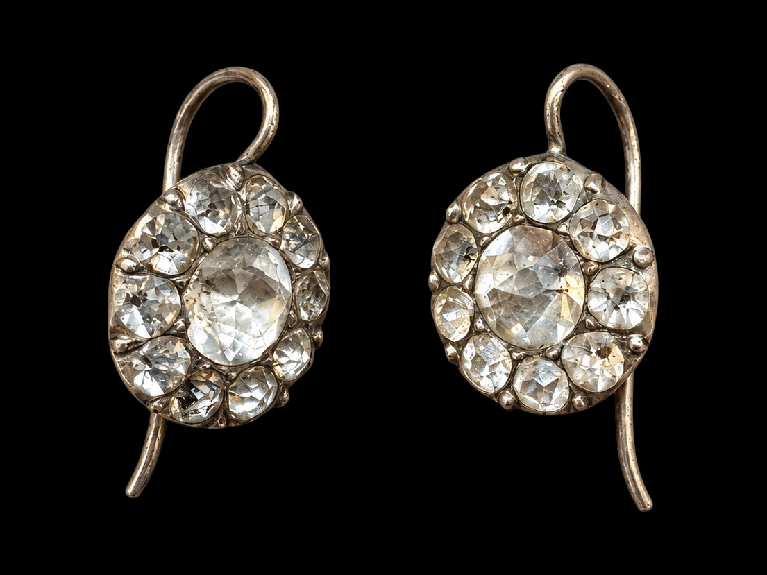 18TH CENTURY GEORGIAN PASTE CLUSTER EARRINGS IN SILVER on black background