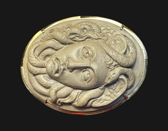 Angled view showing depth of Medusa cameo carving