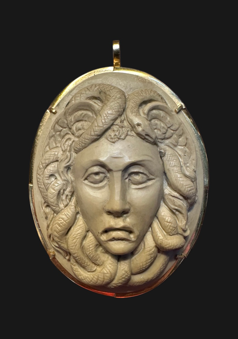 Antique carved lava Medusa cameo in 14k gold, front with pendant bail