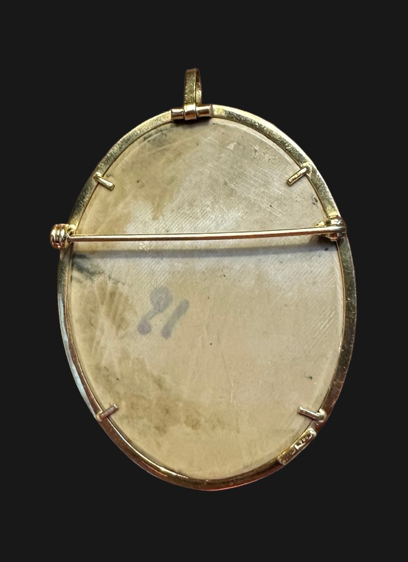 Reverse showing pin clasp and pendant bail